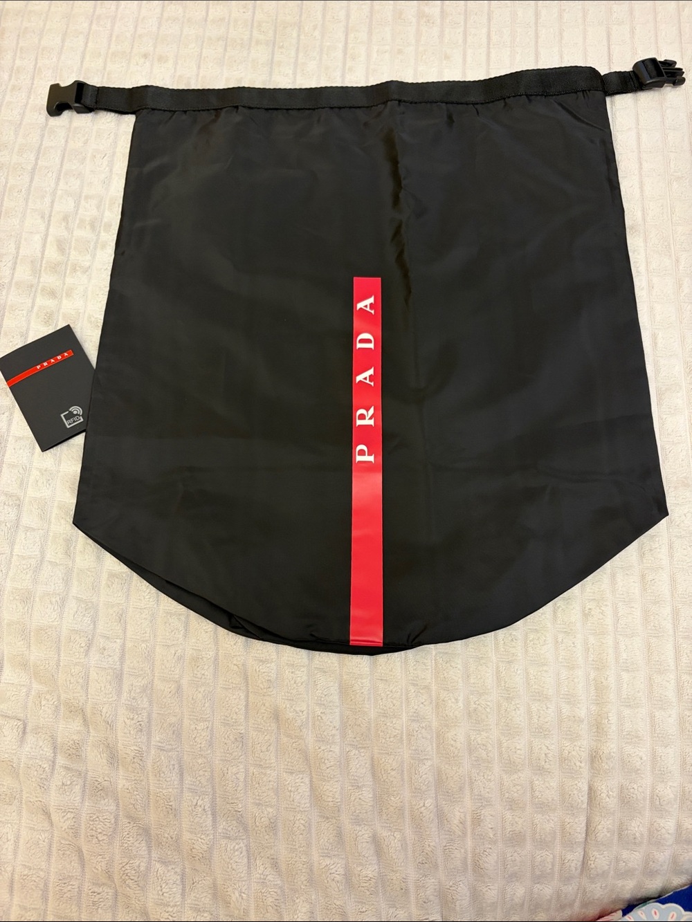Prada Black Nylon Drawstring Bag with Red Vertical Logo